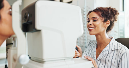 Eye exam, equipment or healthcare with optometrist and patient in clinic for visual assessment....