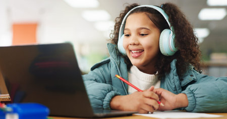 Student, girl and headphones with laptop for e learning, video call or online class for knowledge....