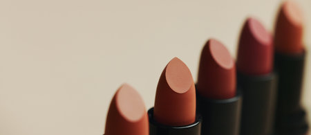 Product space, makeup or lipstick in studio for elegance, beauty and luxury cosmetics on brown background. Closeup, aesthetic and dermatology for mouth grooming, makeover and choice for selectionの写真素材