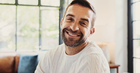 Happy, confident and portrait of man in home with weekend, leave or free time in living room. Smile,...