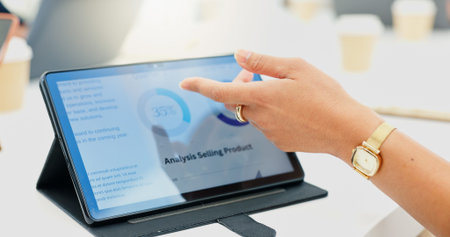 Hand, person and graph with tablet screen in office, analysis selling product and sales performance....