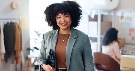 Fashion, tablet and portrait of woman in office with inventory for startup business. Ecommerce, pride and female designer with digital technology for online order with distribution informationの写真素材