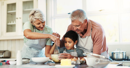 Home, grandparents and baking in kitchen, boy and ingredients with recipe, child development and...