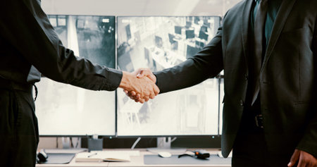 Business people, surveillance and handshake in office for welcome with computer screen....