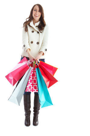 Shopping, portrait and woman with bags, sale and smile for purchase in studio, shopper or discount. White background, space and customer of fashion in retail, person and excited for luxury and mockupの写真素材