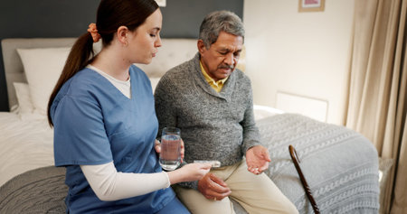 Pills, water and nurse with senior man in home for medication, supplements or vitamins for wellness....