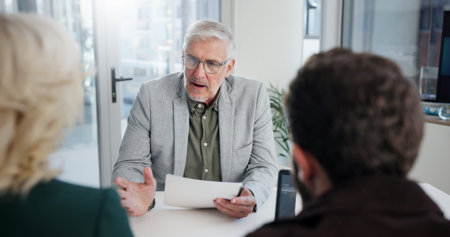 Office, meeting and businessman with document for discussion, investment briefing or review finance....