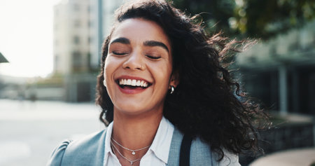 Happy, laughing or businesswoman in city with confidence, finance career or funny humor. Joke, financial advisor or face of investment broker with smile in street for commute or opportunity in Miamiの写真素材