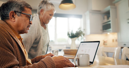 Home, senior couple and stress with laptop for financial crisis, inflation cost and retirement plan. Kitchen, old people and woman with man for insurance mistake, digital bills and worry for debtの写真素材