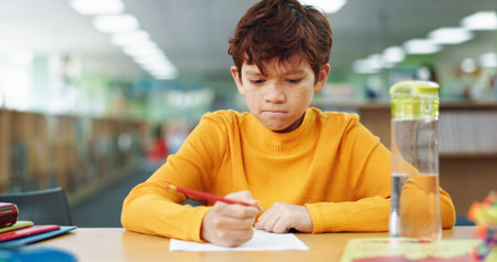 Boy, learning and paper with thinking at library for test, study and development with problem...