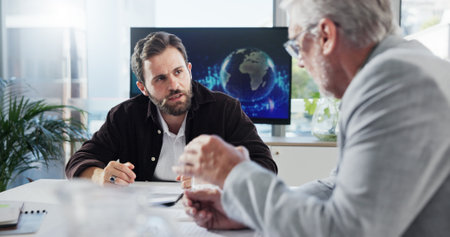 Collaboration, men and meeting in boardroom, conversation and negotiation for global trade in business. Teamwork, colleagues and people with documents for international investment, trader and ideasの写真素材