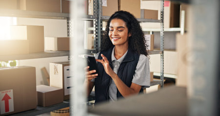 Warehouse, woman and phone with message, logistics and production for quality control or shipping....