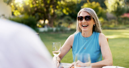 Love, smile and wine with old couple in nature for romance, anniversary date and bonding. Happiness,...