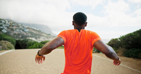 Athlete, man and stretching for fitness outdoor for exercise, cardio training and marathon practice....