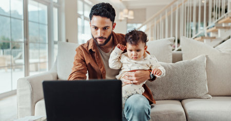Busy, father and laptop with baby at house for multitasking, financial planning and remote work. Productive, man and child for online research, finance report and schedule update of proposal feedbackの写真素材
