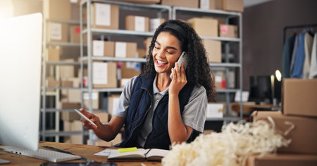 Supply chain, distribution and woman with phone call for delivery, logistics and inventory for ecommerce. Courier, warehouse and employee texting distributor for planning, shipping or supplier stockの写真素材
