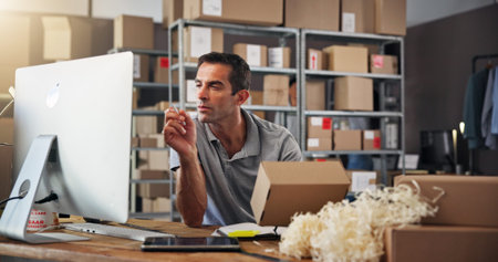 Box, computer and supply chain with man in distribution center for inventory checklist or update....