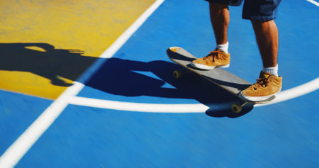 Skateboard, feet and person learning skill for outdoor hobby, activity or challenge at park. Sports, gen z and legs of skater with sneakers for skating training with workout for competition.の写真素材