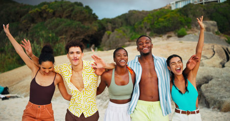 Portrait, happy and friends with hug on beach for travel celebration, freedom and summer holiday. Excited, people and embrace with achievement of vacation trip, tropical island and reunion of getawayの写真素材