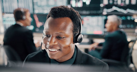 Broker, customer service and man by computer with headset for trading advice, stock market insight and FAQ. Call center, contact us and client query for financial news, NFT assistance and consultingの写真素材