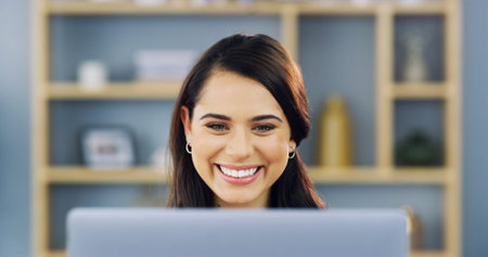 Home, businesswoman and smile with laptop for research, news story and freelancer for publication. Remote work, female person and journalist with tech for blog website, article and happy for editingの写真素材