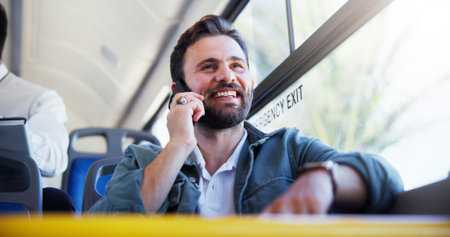 Man, travel and bus with phone call for chat, discussion or connection in public transport. Happy person, traveler or tourist with smile on mobile smartphone for friendly conversation or rideの写真素材