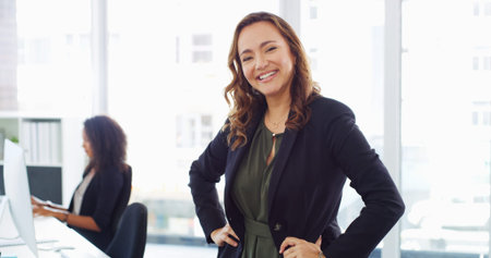 Office, businesswoman and happiness in portrait for accountant, professional career and investment. Confident, female person and financial manager with pride for about us, auditing or accounting firmの写真素材