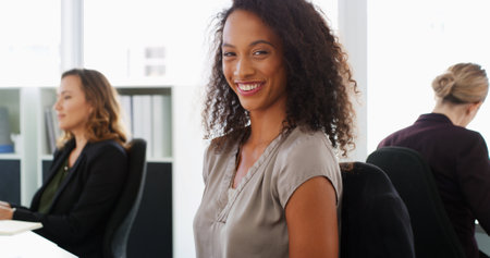 Business, smile and woman in office, portrait and research for climate change. Person, confidence and employee in workplace, article or happiness with investigative journalist and progress for reportの写真素材