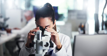 Woman, discovery or forensic scientist with microscope for bio research, new study or experiment....