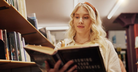 Woman, student and reading book in college library for learning, financial study and business...