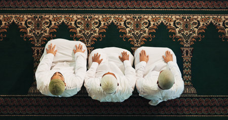 Islamic people, above or group praying to worship for Palestine, gratitude or support to Allah in holy temple. Dua, Muslim religion and asking God for spiritual guidance, blessing or Ramadan Kareemの写真素材