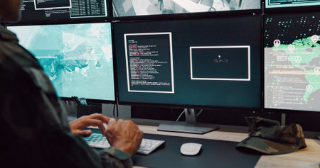 Person, army and typing on computer screen in control room, military battle and monitoring war. Soldier, feedback or global surveillance of satellite warning, government protection and secret serviceの写真素材