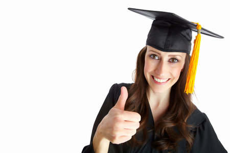 Woman, graduation and achievement with thumbs up in studio portrait with mock up space by white background. Person, university student or like emoji for learning, education or celebration for successの写真素材