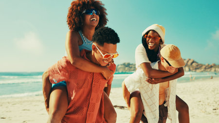 Bonding, couple of friends and piggyback on beach with people outdoor for holiday or vacation. Having fun, laughing or love with group of men and women on coast together for travel or weekendの写真素材