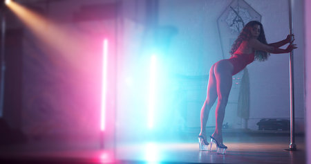 Woman, artist or neon lights with pole for dancing, tease performance or sexy movement in routine....