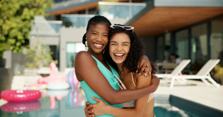 Smile, hug and portrait of friends at pool party for spring break, travel vacation and bonding. Happiness, relax and holiday trip with women at villa resort for hospitality, festival and luxuryの写真素材