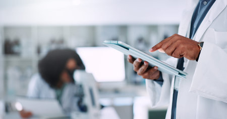 Person, hands and scientist with tablet at laboratory for research, new study or scientific data....