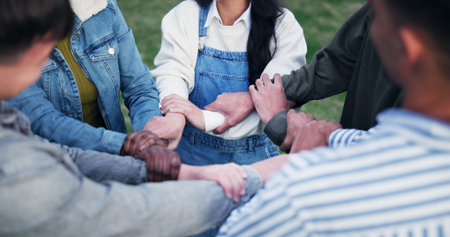 Hands, huddle and solidarity with group of friends for strength, support or unity from above....
