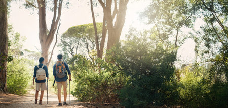 Hiking, back and couple in nature for adventure, trekking and travel on holiday. Mountain, dating...