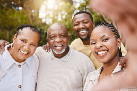 Portrait, black couple and selfie of senior parents outdoor for holiday, vacation or family memory. Elderly mother, father and happy adult son with daughter for photo, pov or face of people at gardenの写真素材