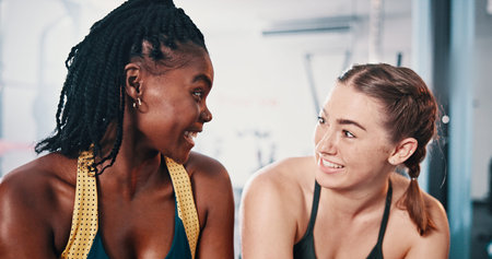 Fitness, conversation and girl friends in gym for morning workout with wellness, health and...