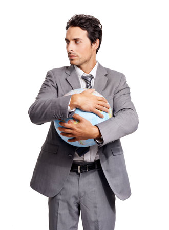 Business man hug globe, earth day or world for future corporate travel isolated on white studio background. Person embrace planet map for geography, environment conservation in ecology or protectionの写真素材