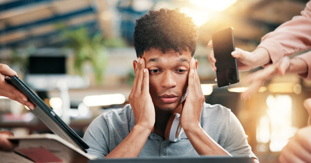 Frustrated, businessman and multitasking with project deadline or demanding employees at office....