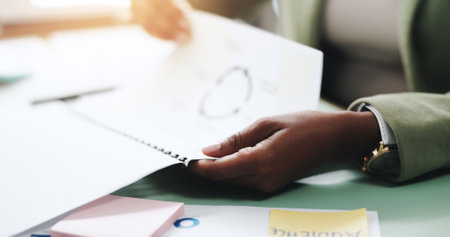 Hands, business person and document with proposal, graphs and profit growth or sales analytics. Closeup, woman or financial advisor with strategy, paperwork and notes for charts or company revenueの写真素材