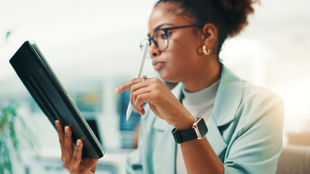 Tablet, stylus and woman in office with notes for web development, update or reading software review. Network, coding and programmer on digital app with pen, thinking and UX design at tech agencyの写真素材