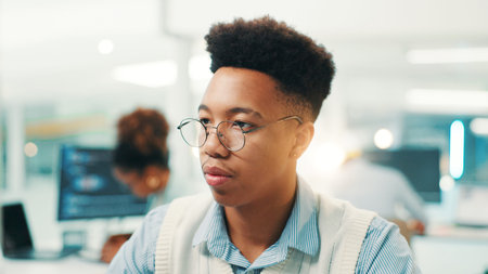 Reading, glasses and programmer with business man in office cyber security, network domain and code analyst. Server encryption, tech startup and software review with person in IT firm for VPN systemの写真素材