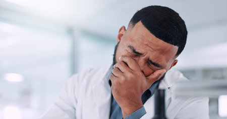 Frustrated man, scientist and mistake with stress for anxiety, depression or science crisis at lab. Male person, health or employee with regret or brain fog for burnout, fail or setback at workplaceの写真素材