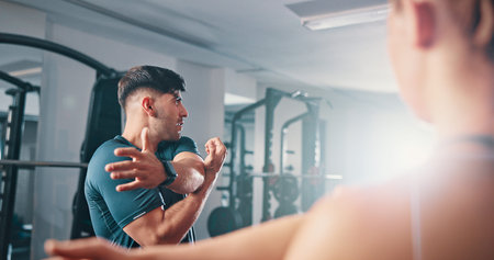 Fitness, exercise and stretching with personal trainer, class and gym for training or workout...