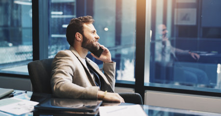 Phone call, negotiation and businessman in office with communication, contact us or connectivity. Cellphone, smile and financial manager on mobile discussion for investment deal for corporate networkの写真素材