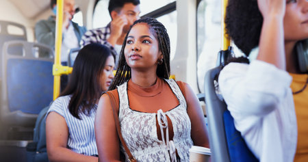 City, woman and travel with thinking on bus for morning commute, urban ride or journey to destination. Sightseeing, passenger or trip on public transport for weekend adventure, metro service or routeの写真素材